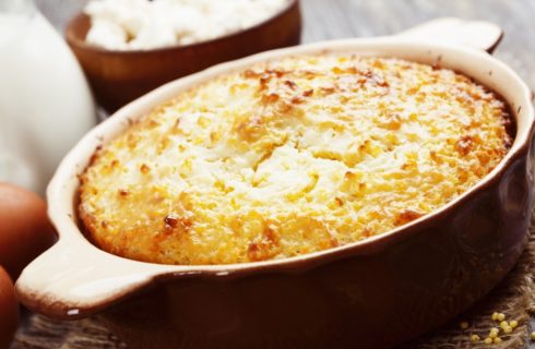 Baked casserole in burgundy stone dish